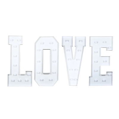White marquee letters spelling LOVE with light bulbs on a white background#whtbkgd