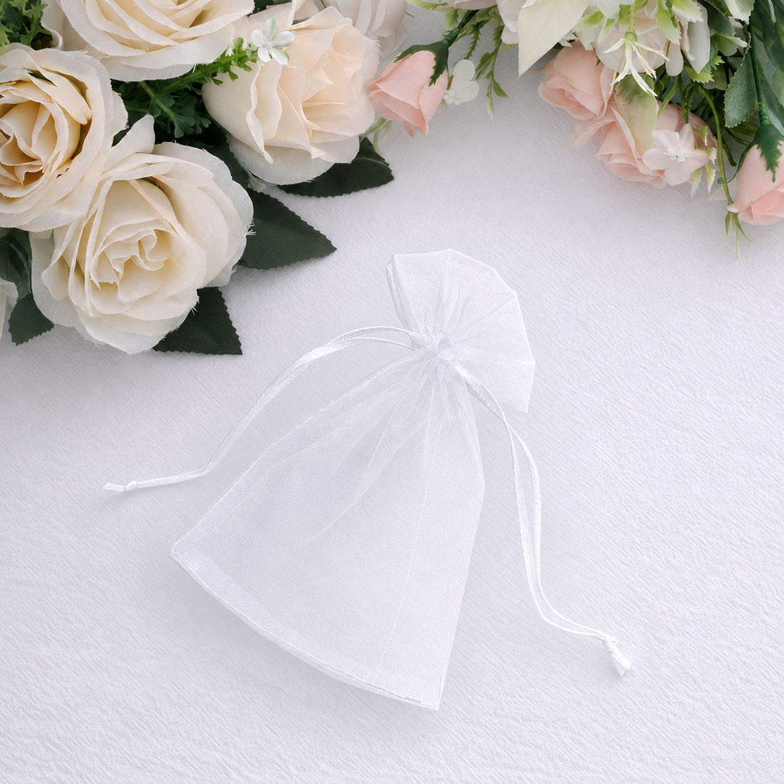 White organza favor bag for back-to-school party treats and take-home gifts