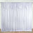 White satin drapery backdrop with gathered detailing