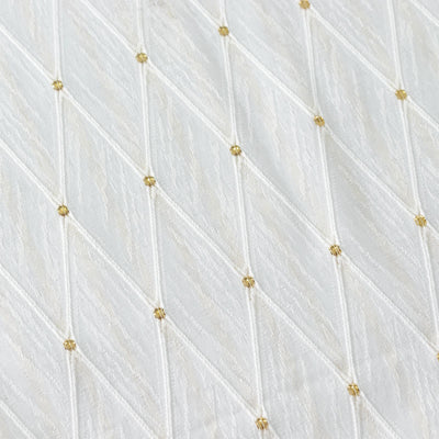 White quilted fabric with gold dot pattern texture#whtbkgd