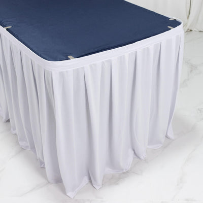 White table skirt with navy table cover for event decor