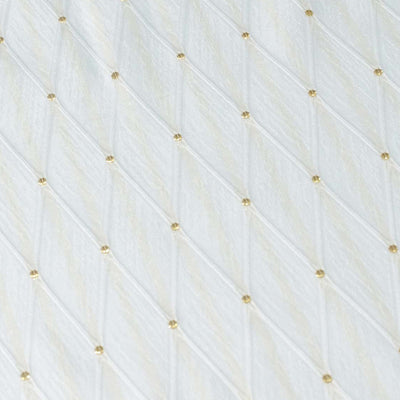 White tufted fabric with gold dots pattern background#whtbkgd
