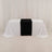 Table with white and black tablecloth in studio setting