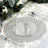 Elegant round mirrored charger plate with crystal accents for dining decor.