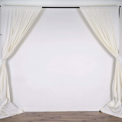 White drapery curtains on a plain background