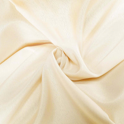 Silky beige fabric showcasing a smooth texture and elegant drape. #whtbkgd