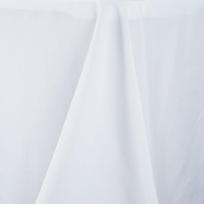 White tablecloth draping elegantly over a table. #whtbkgd
