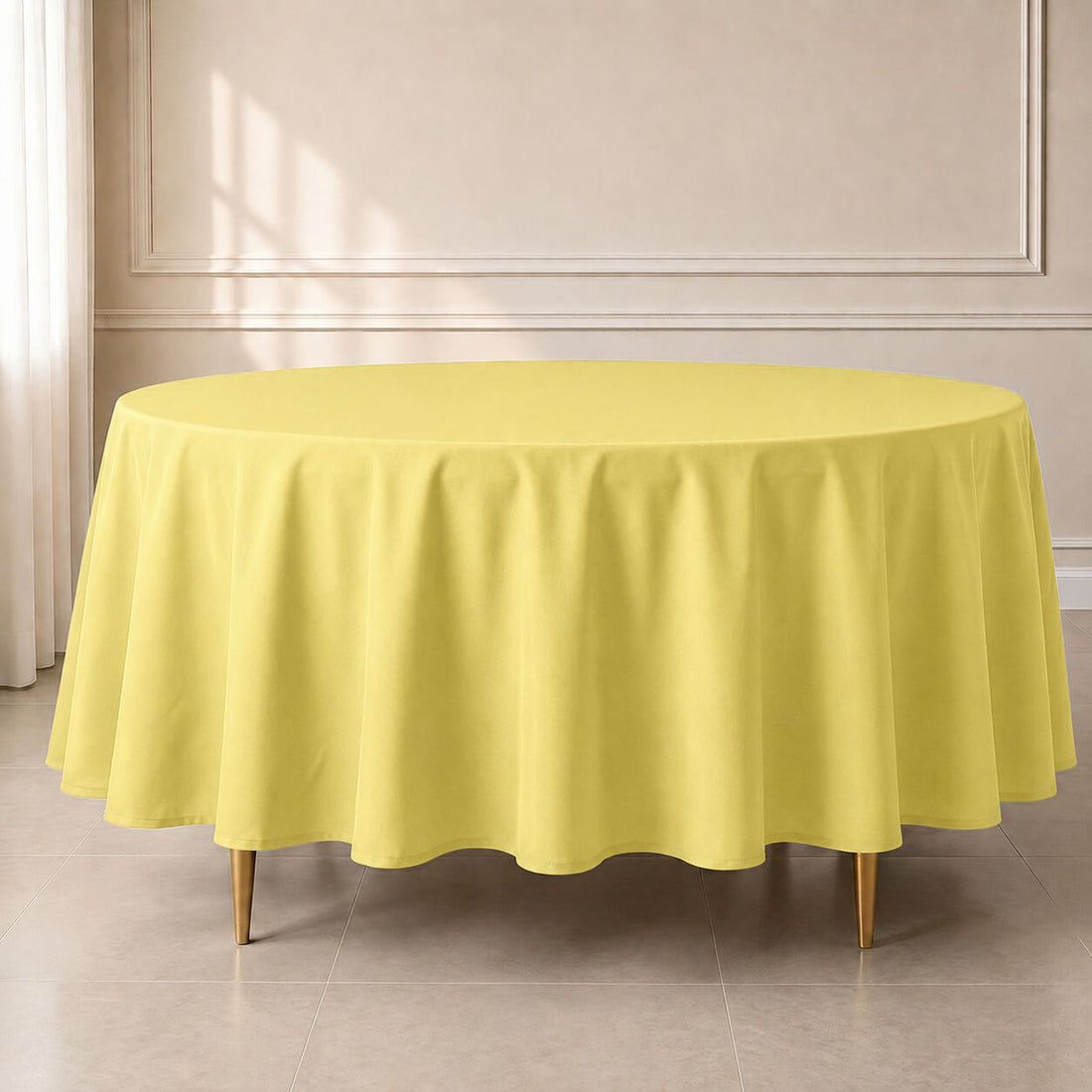 Yellow polyester round tablecloth 108" - durable and stain-resistant.