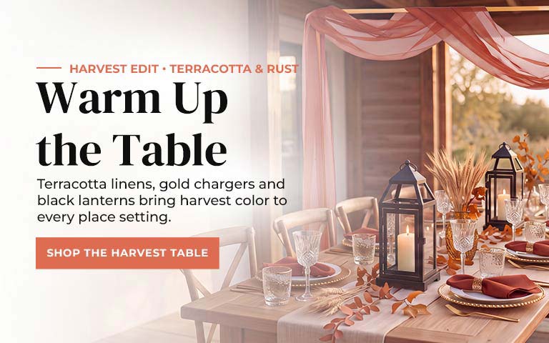 Embrace the season with terracotta linens, sunburst gold chargers, and black lanterns. Create a h...