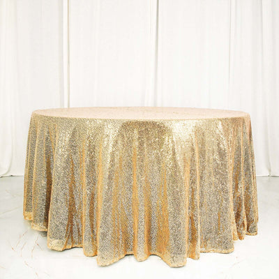 Gold sequin tablecloth draped elegantly over a round table.