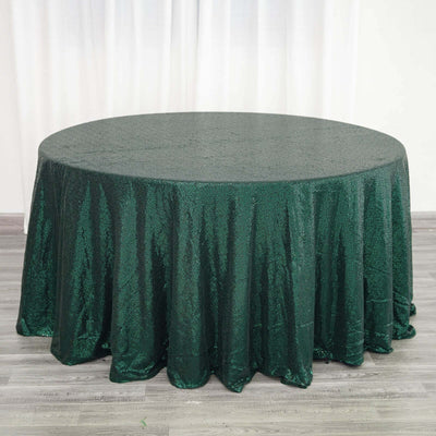 Green sequin tablecloth on a round table