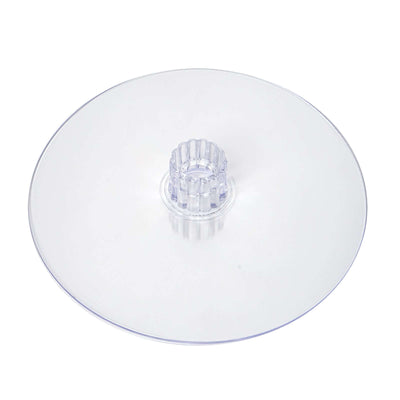 Clear plastic cake stand with a central support.