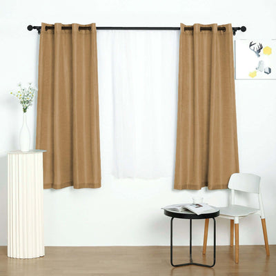 Brown and white curtains hanging in a stylish room setting with furniture.