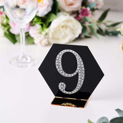 Elegant black hexagon table number 9 with rhinestone embellishments.