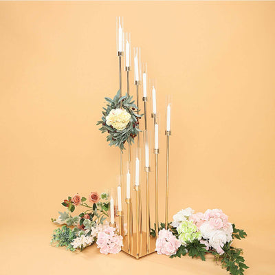 Elegant candle holder with floral arrangement on a soft background.