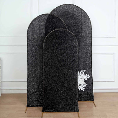 Black decorative privacy screens in three sizes against a white wall.