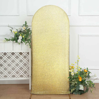 Gold sequin backdrop with floral arrangement for photo sessions