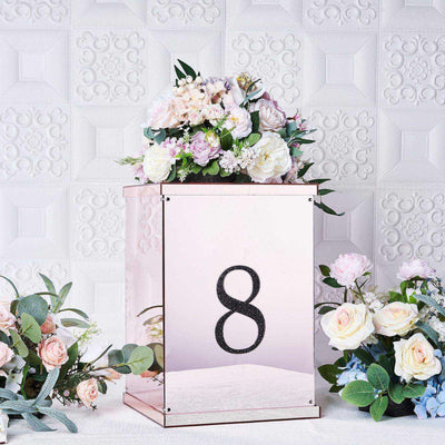 Rose gold floral display box with the number 8, adorned with flowers.