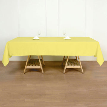Add Elegance to Your Event with the Yellow Seamless Polyester Rectangular Tablecloth