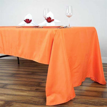 Enhance Your Event Decor with the Orange Seamless Polyester Rectangular Tablecloth