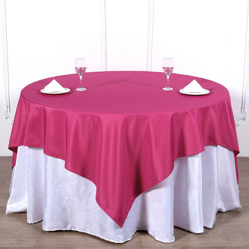 Add Elegance to Your Event with the Fuchsia Square Seamless Polyester Table Overlay 70"x70"