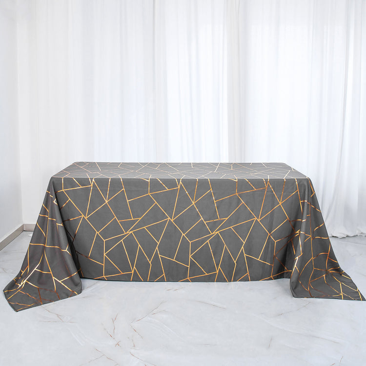 90 Inch x 132 Inch Charcoal Gray Polyester Tablecloth With Gold Foil Geometric Pattern