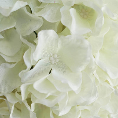 Close-up of delicate white artificial flowers.
