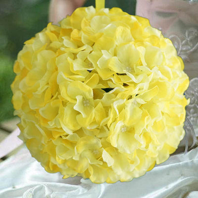 Yellow floral ball decoration for weddings or events.