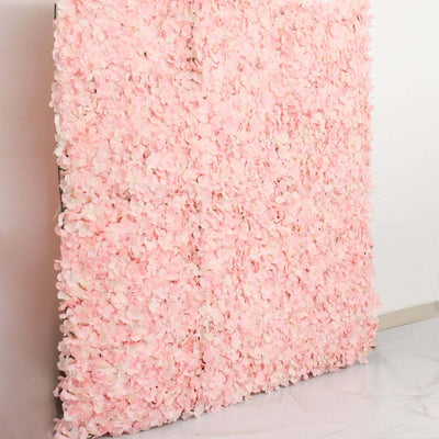 Pink floral wall backdrop for events and photography.
