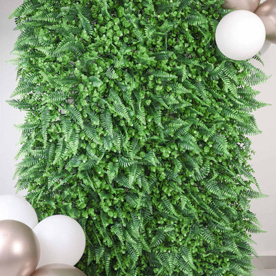 Artificial greenery wall with decorative balloons for events and photography.