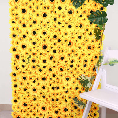 Vibrant yellow sunflower wall decor with greenery accents.