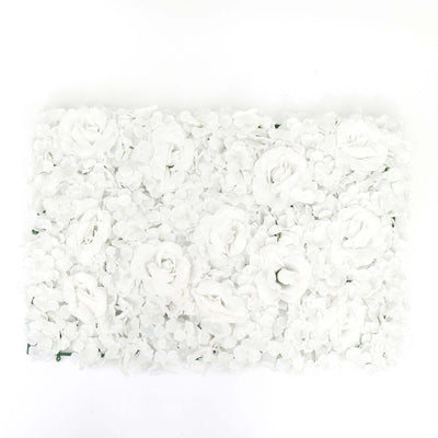 White floral wall decor featuring roses and hydrangeas against a plain background