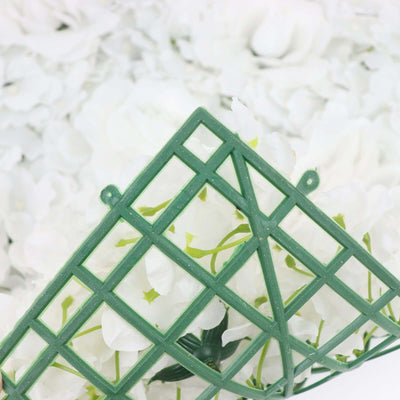 Green trellis against a backdrop of white flower petals.