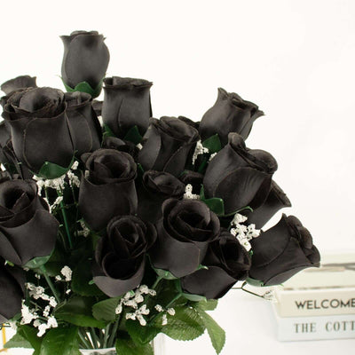 Black artificial roses bouquet with greenery