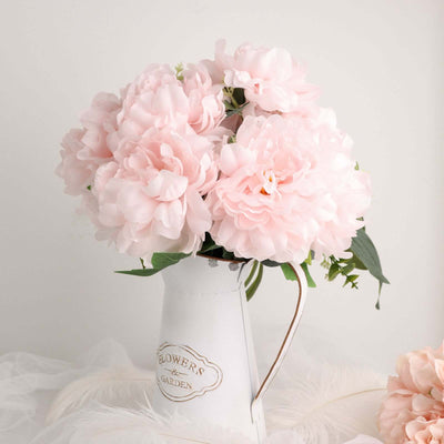 Pink peony bouquet in a vintage white pitcher