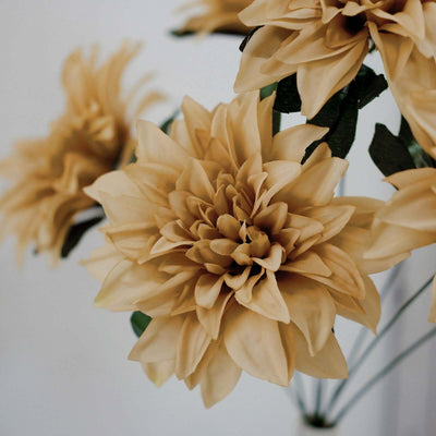 Beige artificial flower bouquet on a neutral background.