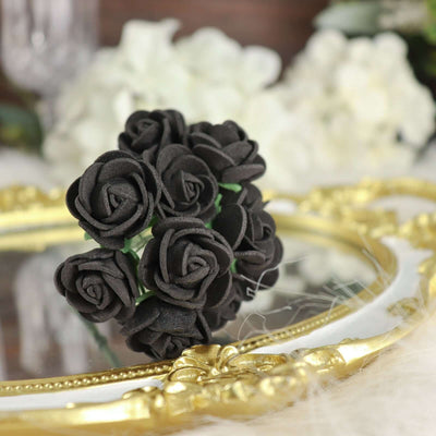 Black foam roses bouquet on a decorative mirror.