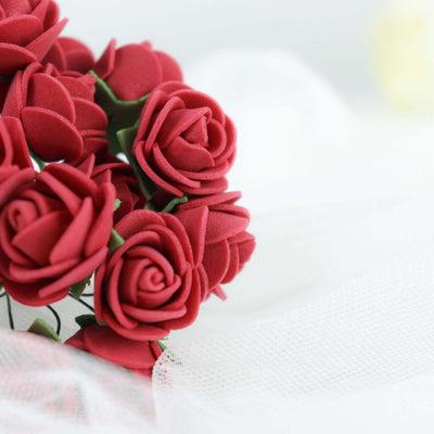 Red artificial roses arranged beautifully.