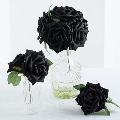 Black rose bouquet in glass vases for elegant decor.