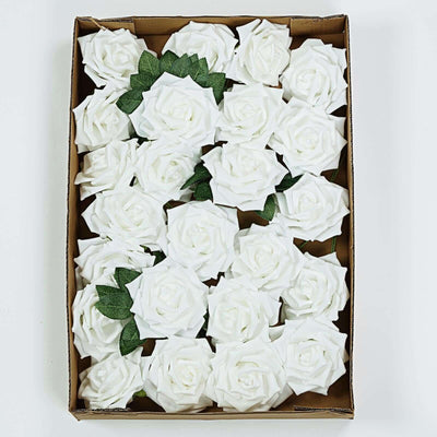 White artificial roses in a cardboard box arrangement.