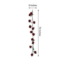 Floral backdrop décor and floral garlands: Silk burgundy rose garland with measurements of 9 inches and 72 inches
