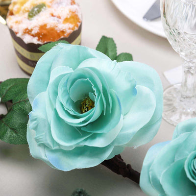 Mint green silk rose with leaves, perfect for floral arrangements or decor.