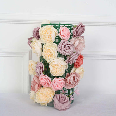 Artificial flower arrangement in a decorative green vase.