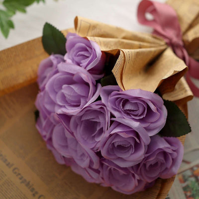 Purple rose bouquet wrapped in decorative paper.