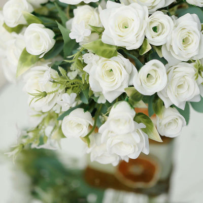 White artificial rose bouquet arrangement for home decor.