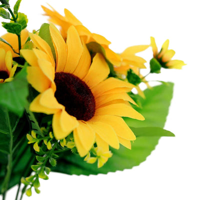 Artificial sunflower bouquet with vibrant yellow petals and green leaves