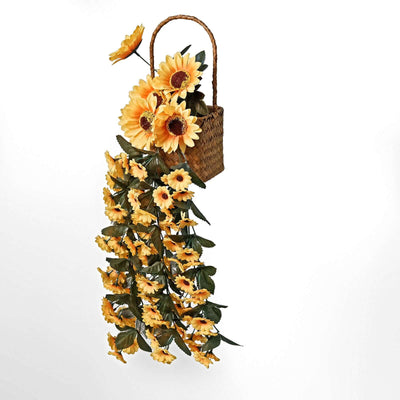 Sunflower arrangement in a woven basket, cascading floral design.