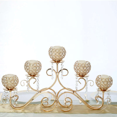Elegant gold candle holder with crystal accents for five candles.