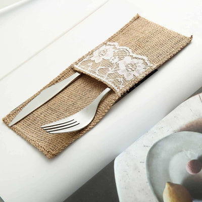 Burlap cutlery pouch with lace detail holding fork and knife