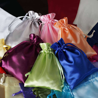 Colorful satin drawstring bags in various shades arranged artistically.